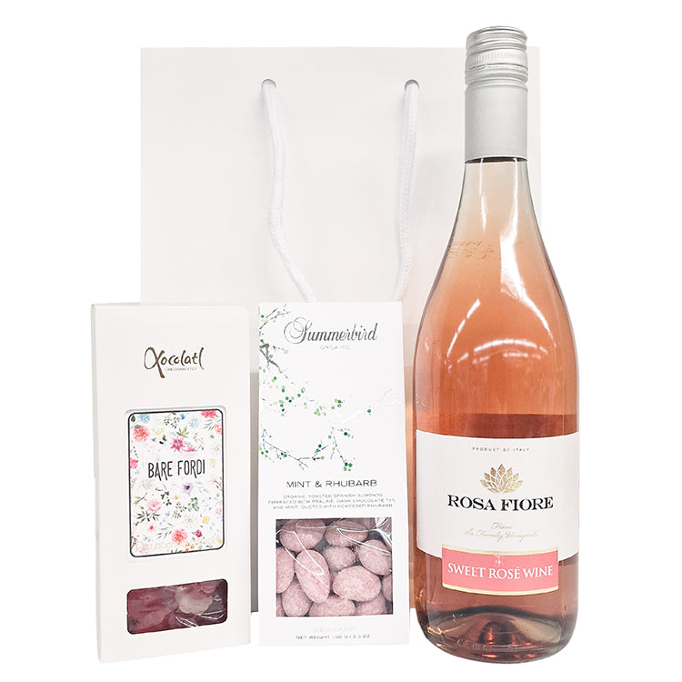 Gavepose med sweet sparkling wine, mandler og vingummi