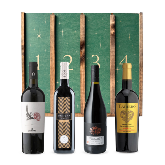 Eksklusiv adventskalender med 4 rødvine med spanske og italienske vine. Lav december måned til et vin-eventyr og ultimativ forkælelse