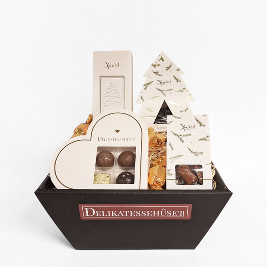 Julekurv med forskellige chokoladeprodukter fra Xocolatl. Send en gavekurv til jul.