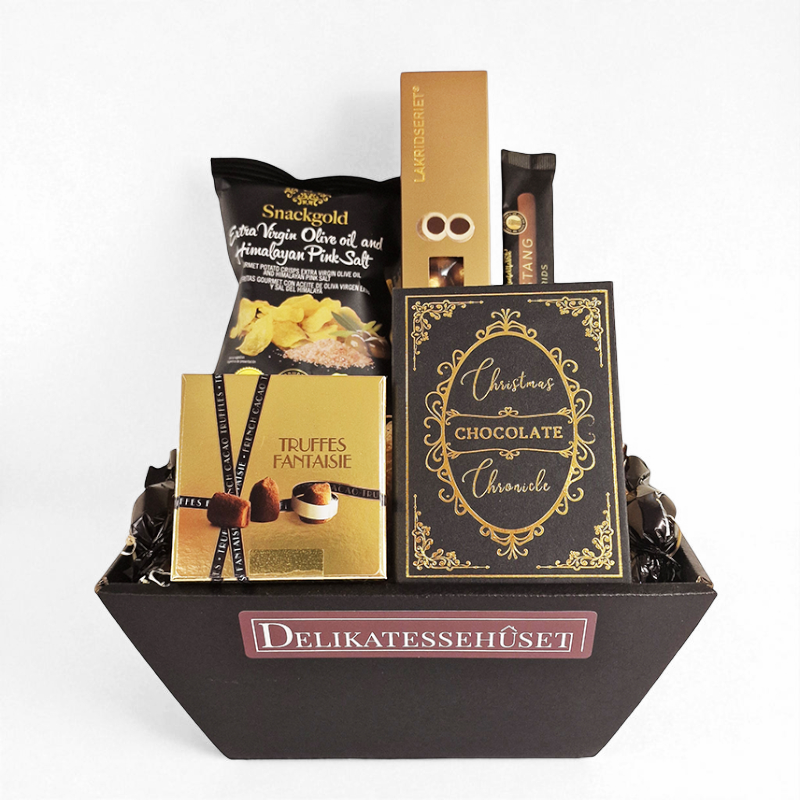 Smuk guld julekurv med trøfler, chokolade og andre lækkerier