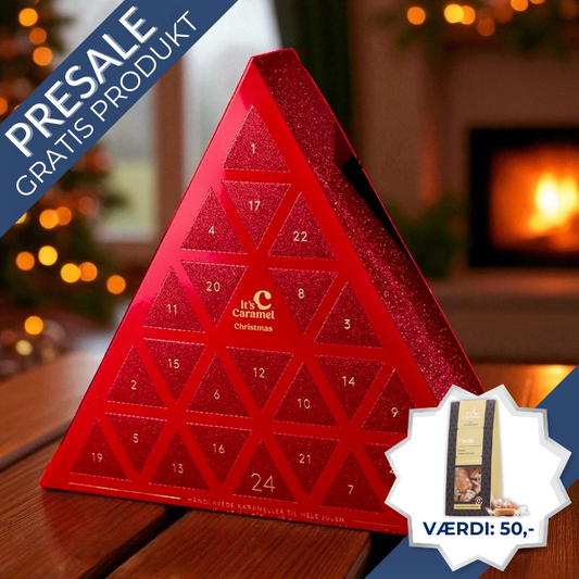 Karamelleriet julekalender i trekantet glitrende design med 24 låger fyldt med bløde fudge-karameller, chokoladeovertrukne karameller og håndlavede klippestykker.	