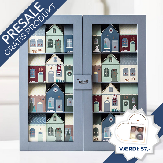 Xocolatl familiejulekalender – elegant display med 24 små julehuse fyldt med chokolader, karameller, vingummi, lakrids og andre søde overraskelser.	